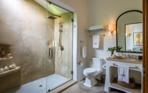 aesthetic bathroom with a big shower area using frameless shower door